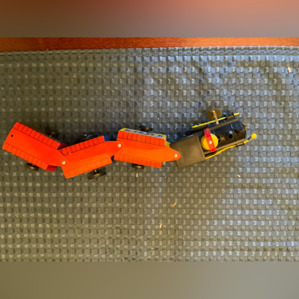 Vintage child’s metal train toy